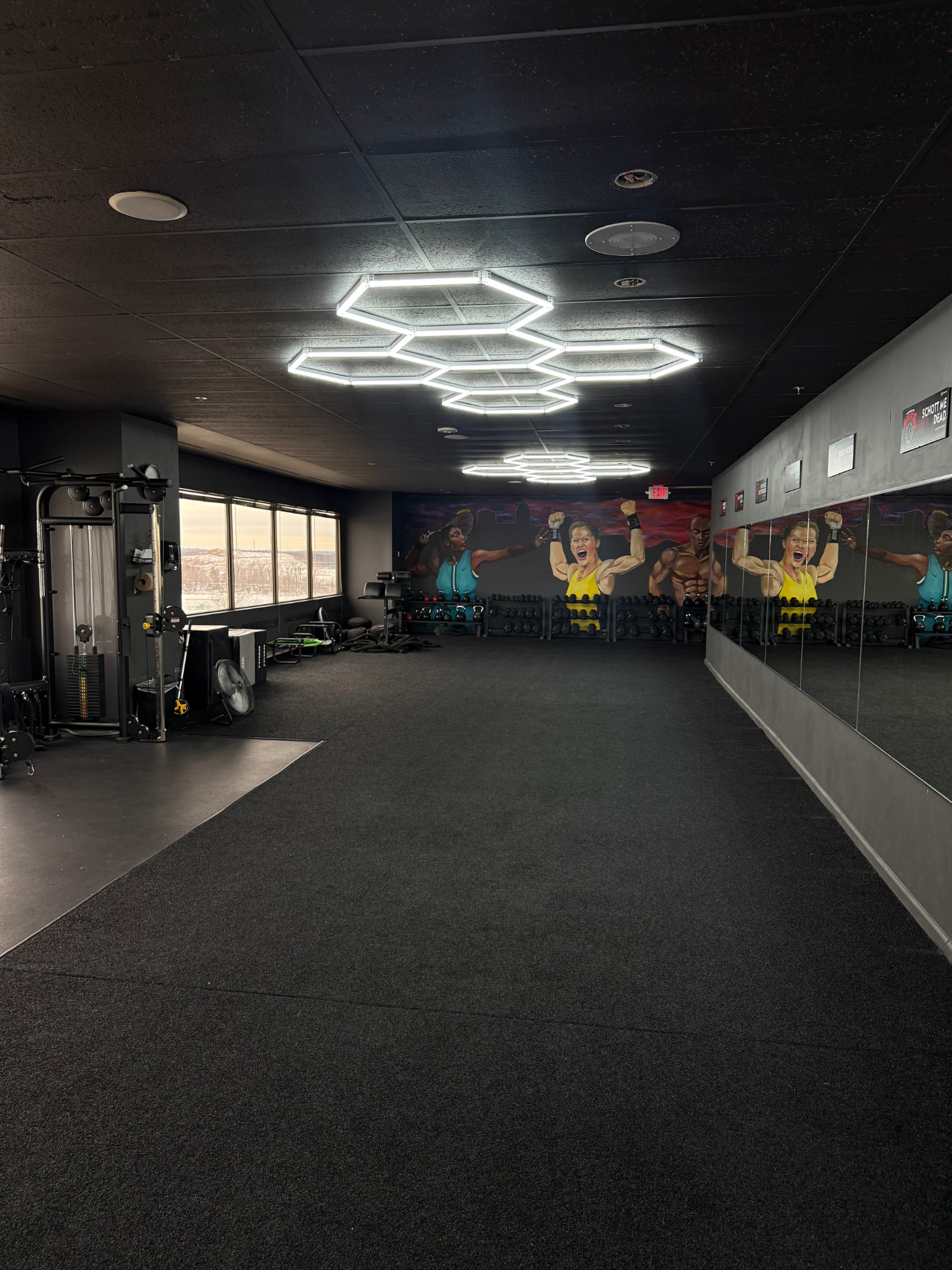 Untitled design (81) A gym workout place with equipements